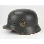 4.1.) Uniformen / Kopfbedeckungen Wehrmacht: Stahlhelm M35, mit Doppelemblem.Glocke mit