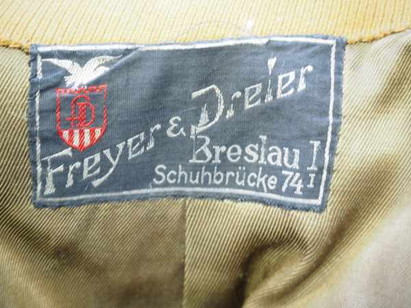 4.1.) Uniformen / Kopfbedeckungen NSDAP/SA/NSKK: Dienstrock eines alten Kämpfers.Braune Gabardine, - Image 4 of 5