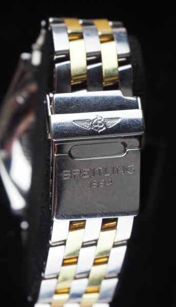 7.5.) Uhren Breitling - Chronomat Automatic.Stahl und Gold, marineblaues Zifferblatt mit goldenen - Image 5 of 6