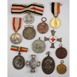 1.1.) Kaiserreich (bis 1933) Deutsches Reich: Lot von 12 Auszeichnungen.Diverse, teils am Bande.