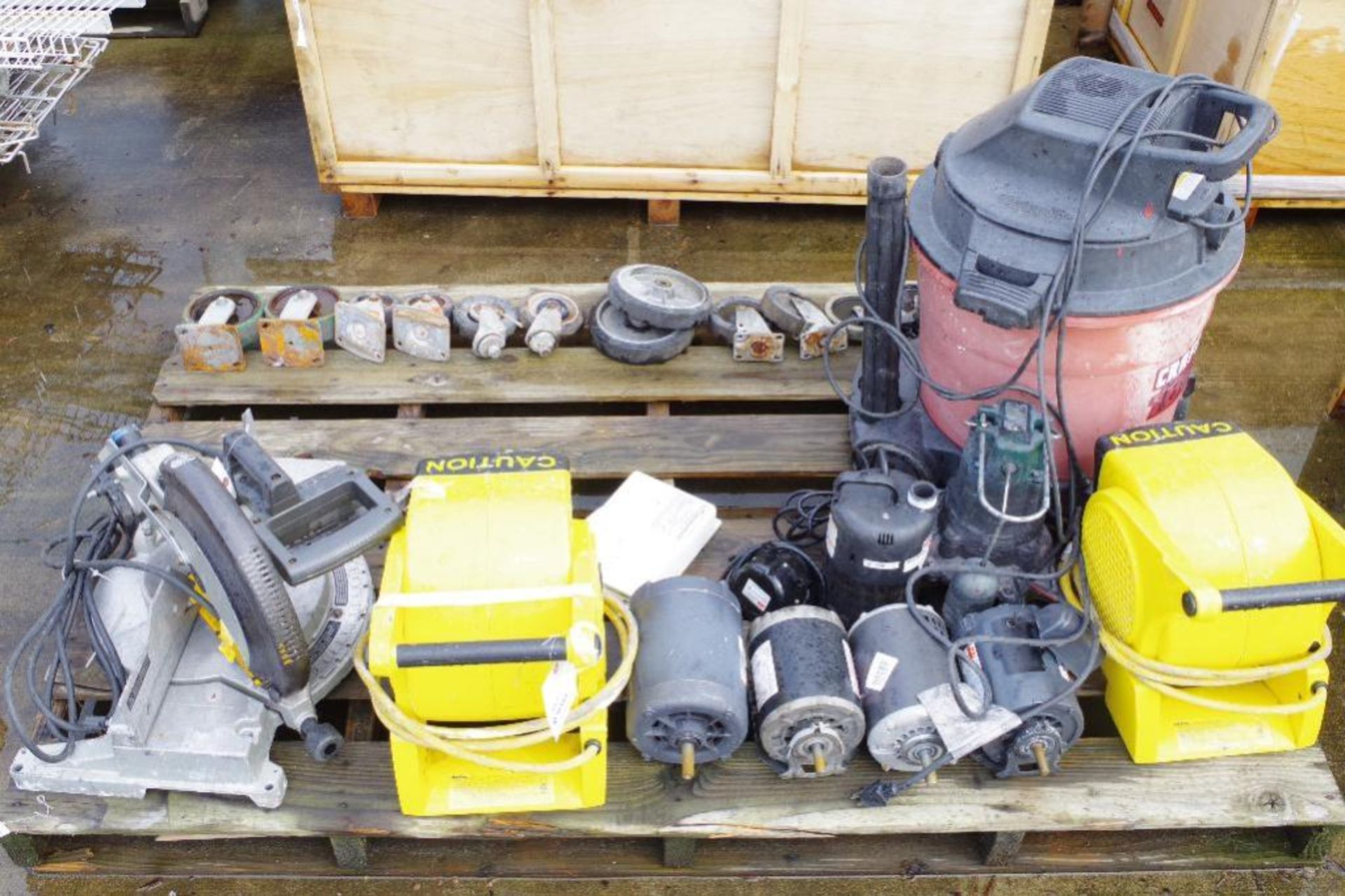 (QTY) Pallet of Misc. Items: Vacuum, Electric Motors, Saw, Casters & More (Condition Unknown)