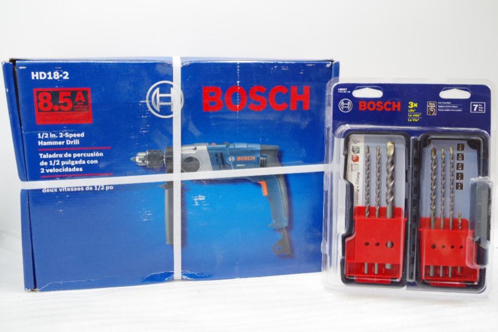 (1) NEW BOSCH 120V 1/2" 2-Speed Hammer Drill & (1) NEW BOSCH 7pc. Concrete Carbide Tip Bit Set