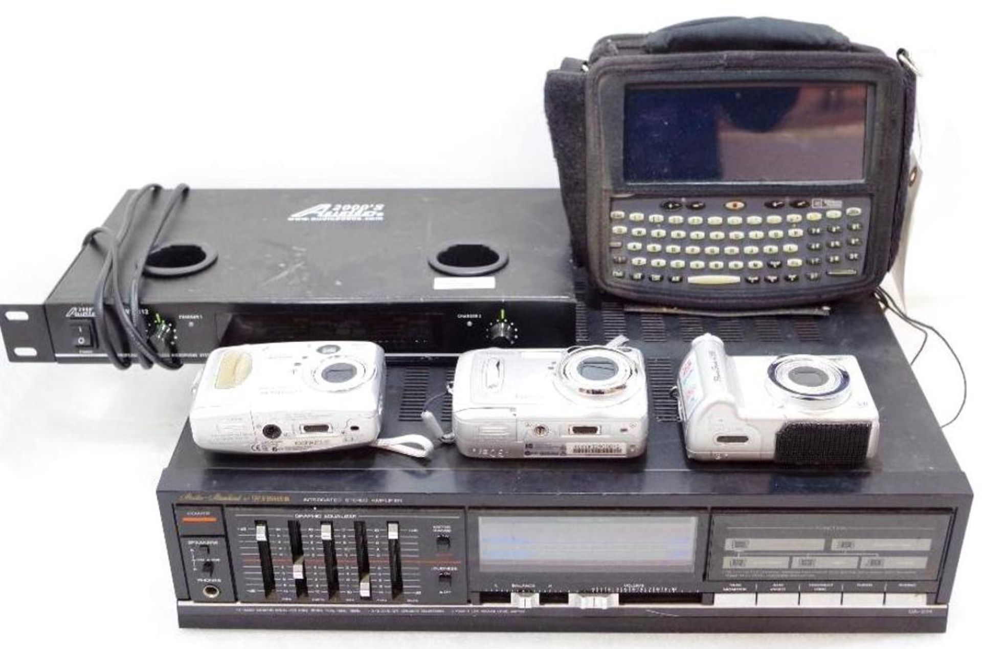 [6] Misc. Electronics: (3) Digital Cameras, (1) Amplifier, (1) Wireless Mic. System & (1) Teletype