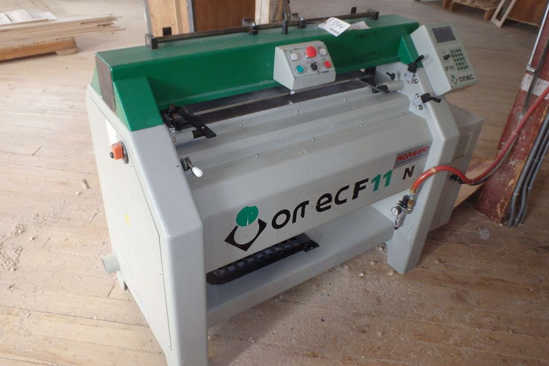 2004 OMEC F11CN Dovetailer