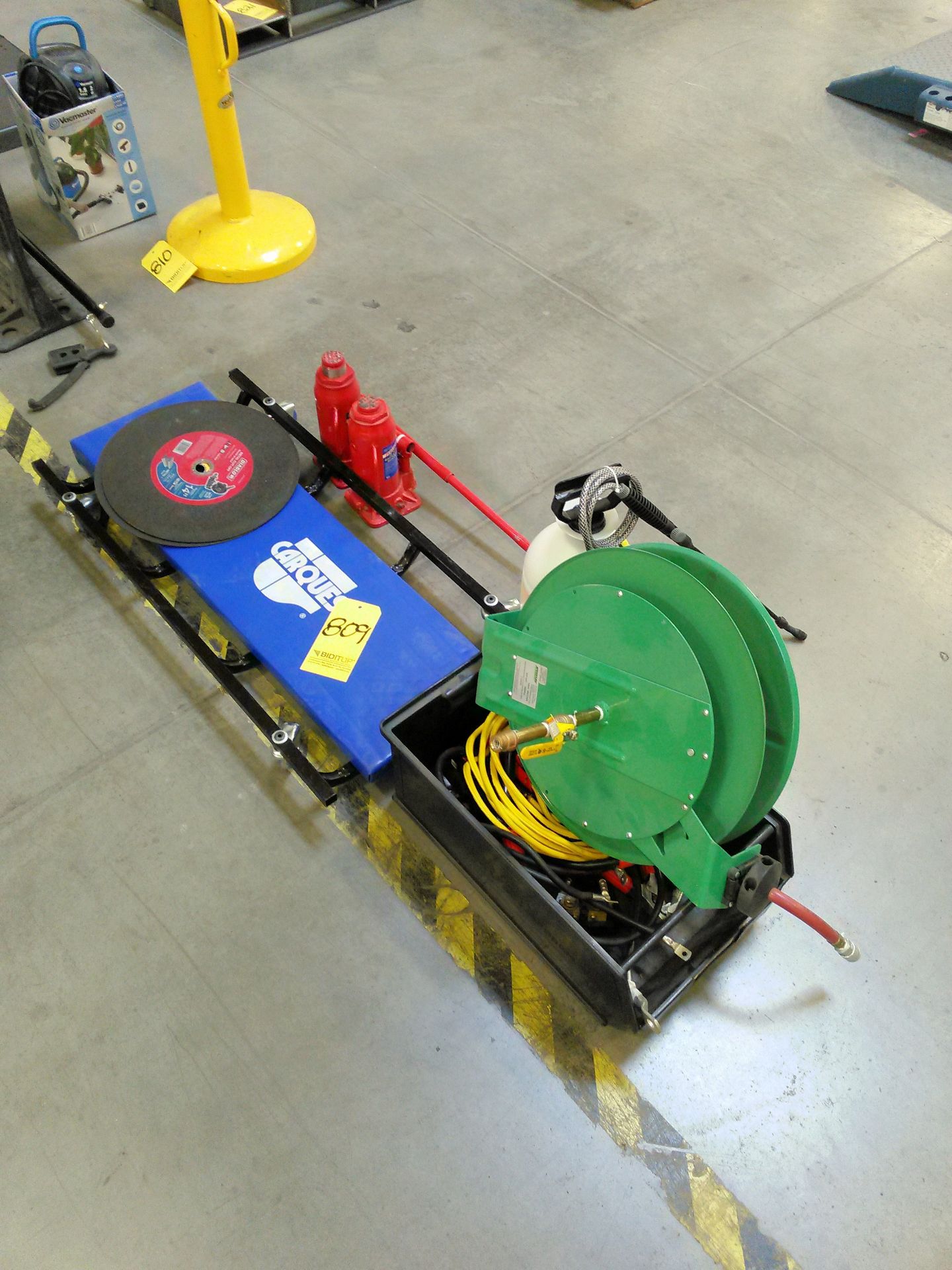 Lot-Hose Reel, Jumper Cables, Sprayer, (2) Bottle Jacks, Cut-Off Blades and Floor Creeper, (Bldg 2)