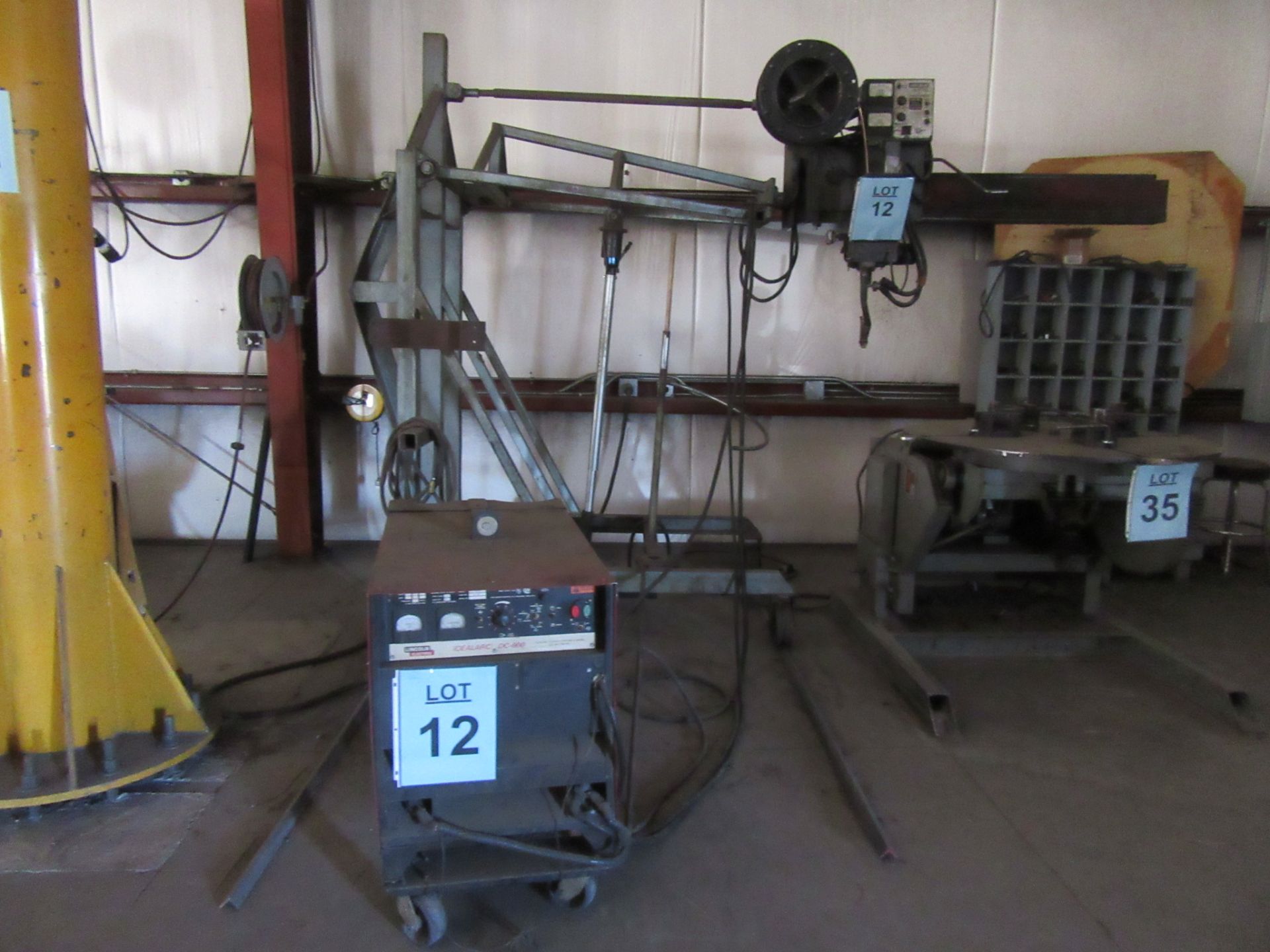 LINCOLN DC-600 WELDER WITH LINCOLN NA-3S WIRE FEEDER AND 2000 LB. JACK STAND, (BACK BUILDING)