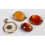 Agate brooches, together with a flower pendant. (4)