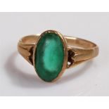 9 carat gold ring, set with a green paste stone