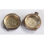 Two silver watch cases