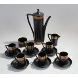 Portmeirion coffee service decorated with gilt Greek key on a black ground