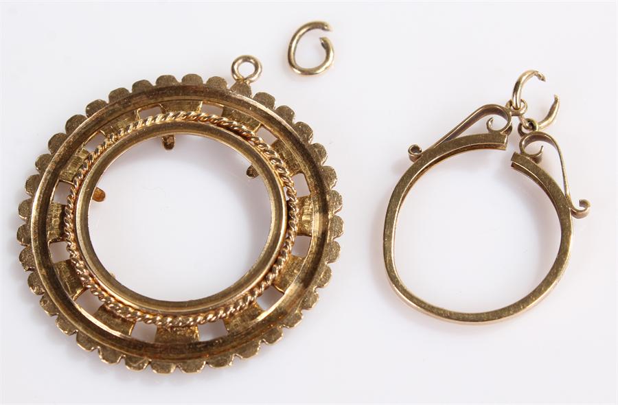 Two 9 carat gold coin mounts, weighing a total of 5.8 grams