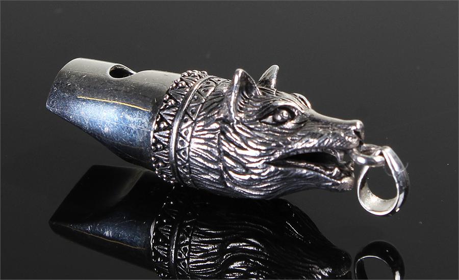 Silver whistle in the form of a Fox head