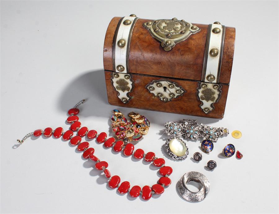 Victorian Walnut Domed casket together with some jewellery, including a bracelet, a necklace and a