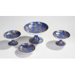 Royal Doutlon porcelain, to include a larger tazza, a pair of tazza and a dish, decorated with