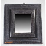 18th Century Dutch Ebonised Wall Mirror, the rectangular plate within stepped rectangular frame with