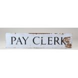 Early 20th Century white enamel sign, with the black lettering "PAY CLERK", 69cm x 16cm