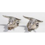Pair of silver plated Bulls head ornaments, maker T.W, of naturalistic form, 9cm wide, (2)