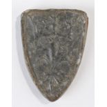 Large Tudor lead weight, shield shape, decorated with a fluer de lis below a crown, 75mm high