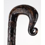 Highly decorative 19th Century walking stick, carved with the British and the Anderson family crest,