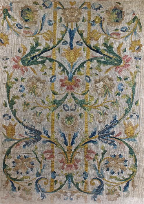 18th Century silk embroidery, with foliate decoration in a modern frame, including frame 77.5cm x