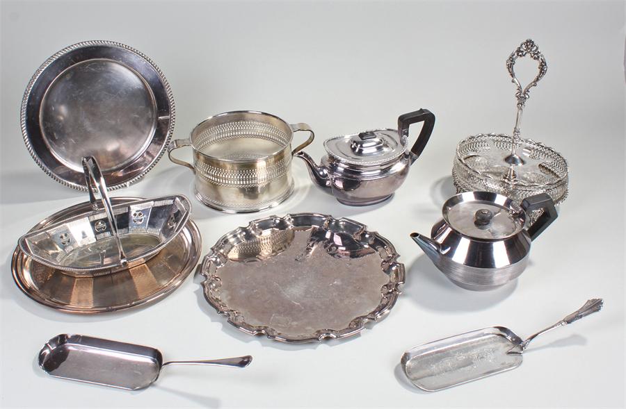 Silver plated wares. to include three plates, two crumb scoops, a basket, dish ring, cruet stand and