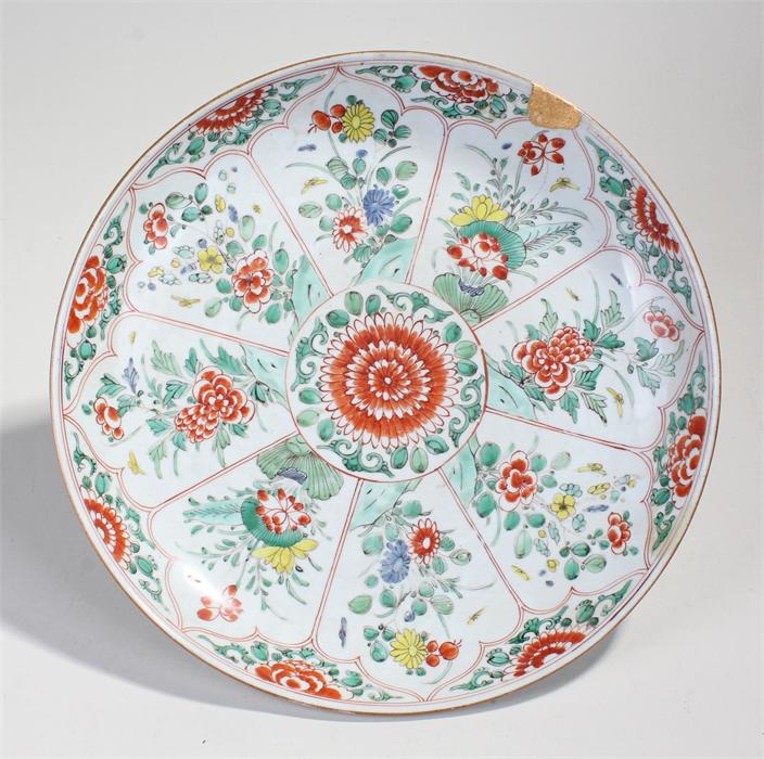 18th Century Chinese porcelain charger, the central red chrysanthemum with flowers held within red