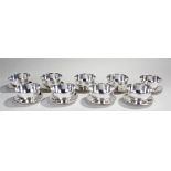 Set of nine silver plated bowls and dishes, each with a turned lip above a dish, (18)