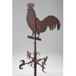 19th Century wrought iron weather vane, with a cockerel to the top above a rod and cross, 116cm