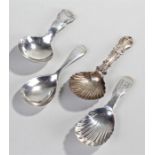 Four silver caddy spoons, to include a Victorian Irish silver shell bowl caddy spoon, Dublin 1848