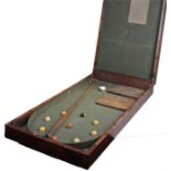 Mahogany box containing Bar Billiards, a cue and nine balls. closed box 91x46x11cm deep