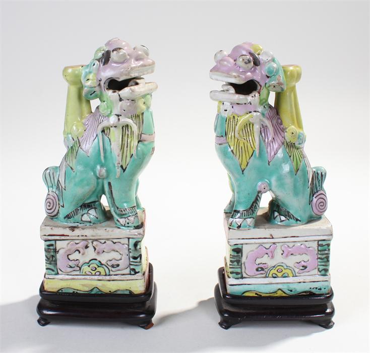 Pair of Chinese dogs of Fo incense burners, both with mouth slightly open, incense container to