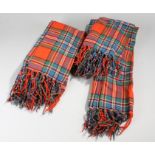 Two tartan sashes, crisscross design in reds, greens and blacks, (2)