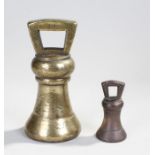 Two bell weights, the first a 14 pound example, stamps for Victoria, the second a George III example