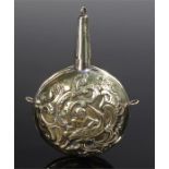17th Century brass priming flask, the circular body with figural and scroll decoration to both