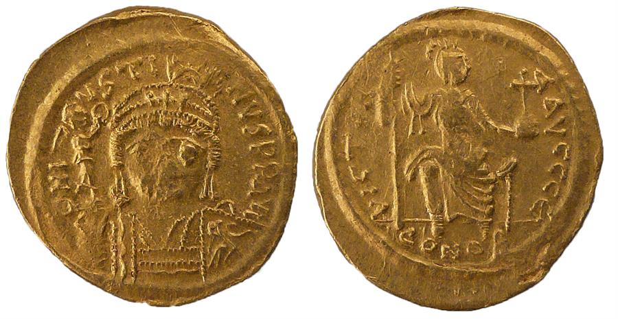 Byzantine Justin II AD 565-578 Solidus, helmeted and cuirassed bust facing, holding Victory on globe