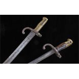 Two French bayonets, the first blade marked St Etienne 1870, the second St Etienne Mai 1879, (2)