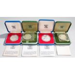 Silver Crowns, to include two cased 1977 example and two Queens Jubilee 1972 examples, cased, (4)