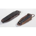 Two World War II folding knives, with chequer grips and folding blades/tools, (2)