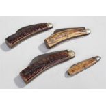 Collection of four folding knives, to include three examples by Saynor and another folding knife,