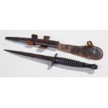 Fairbairn-Sykes type fighting knife, the black double sided blade with wood ring turned grip,