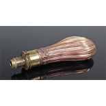 Sykes patent powder flask, with a copper ribbed body and brass spout top, 21cm long