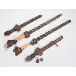 Chinese coins, the coins tied to rods forming daggers, (4)