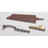 19th Century medical equipment, to include a toothkey, surgical saw blade and a fleam, (3)