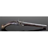 18th Century flintlock pistol, the brass butt with carved stock and grip, steel hammer and action,