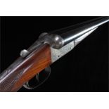 W. J. Jeffrey 12 bore double barrelled side by side shotgun, the stock with chequer grip, two