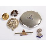 Military related objects, to include a Royal Artillery silver compact, three Artillery brooches, a