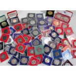 Cased coins, various types and styles to include St Helena, Seychells, Isle of man, New Zealand