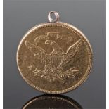 USA gold medallion, with an eagle below the text "In god we trust" the revsere with the engraved