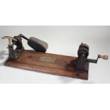 Vulcan Foundry Cable stretcher, J Hetherington & Sons, with a block base and gauge to one end,