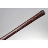 Late 19th Century inlaid Indian walking stick, the inlaid stick with a geometric swirl and pear
